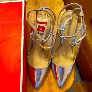 Brand new Coach silver heels